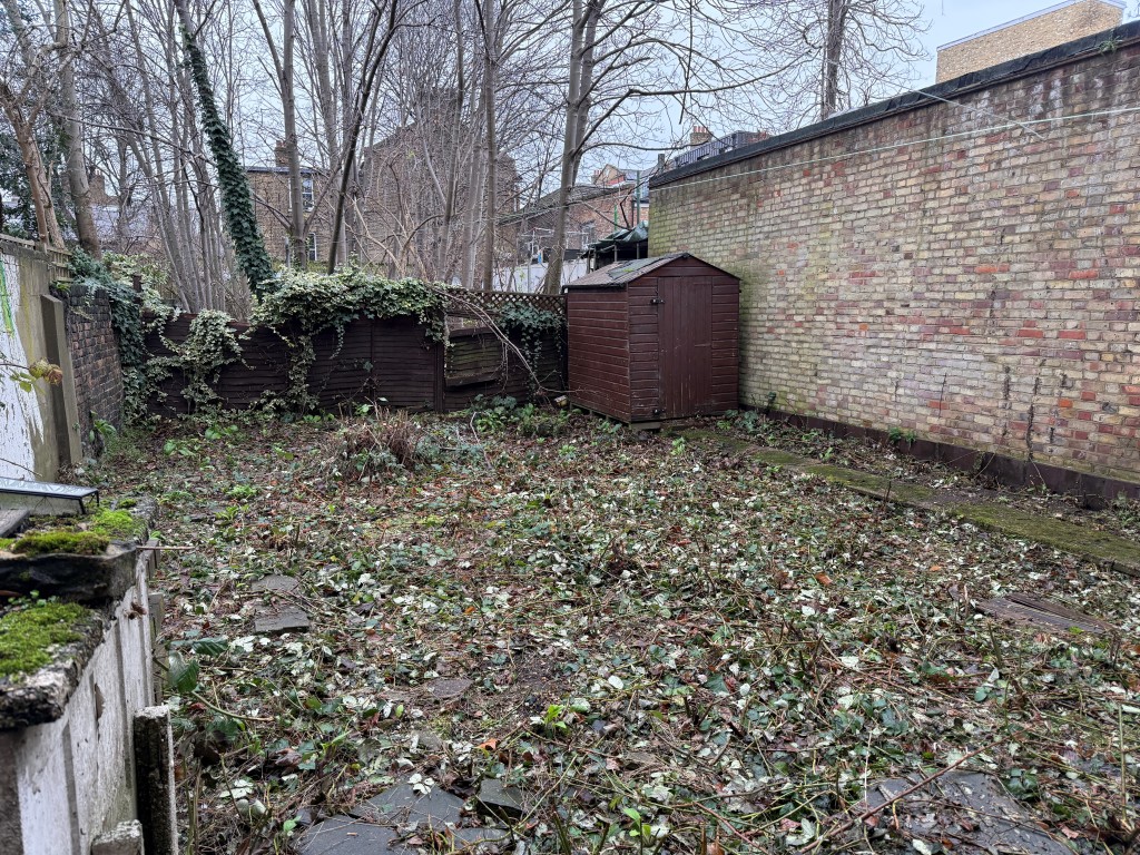 Lot: 44 - LAND WITH POTENTIAL JUST OFF CLAPHAM COMMON - View of land from front of the Pavement